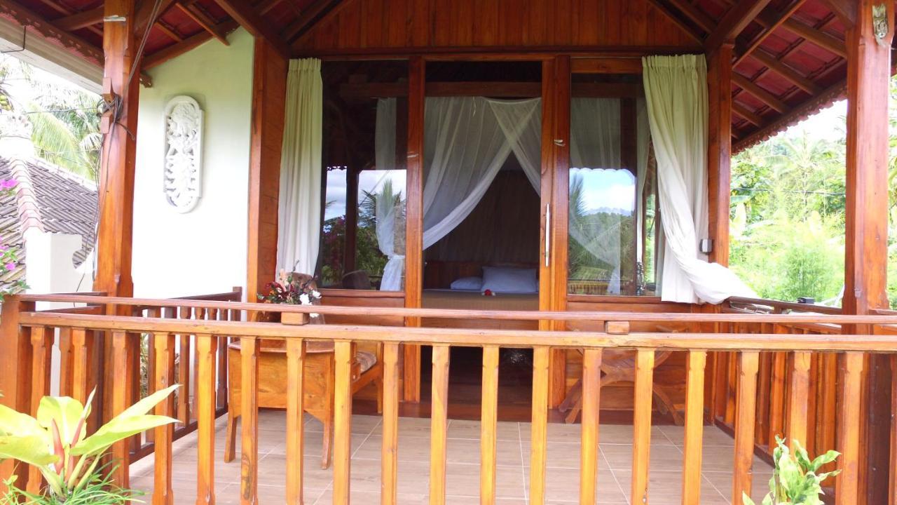 Kubu Shanti Sanda Munduk Esterno foto